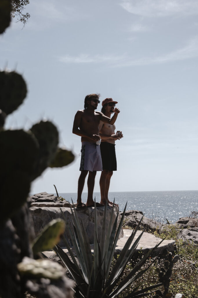 Two friends looking into the ocean