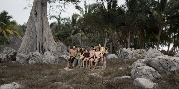 Group of friends sitting in nature
